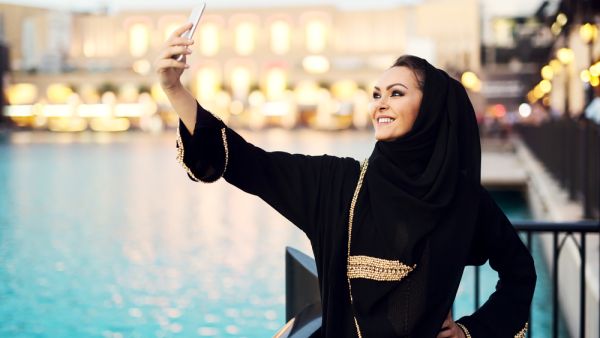 Woman taking selfie in Dubai