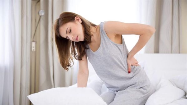 هل ألم الظهر قبل الدورة من علامات الحمل