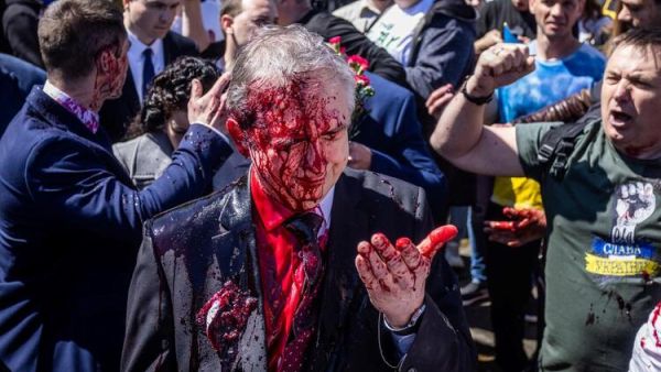 Russia's Ambassador to Poland Splattered With Red Paint