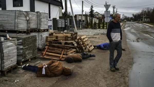 Mass Graves, Bodies of Executed Civilians Found as Russia Leaves Kyiv