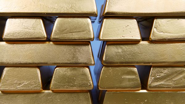One of the robbers then went to the vault, which was open, and filled a backpack with 1,567 gold coins. 