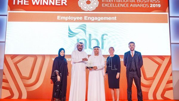 NBF team receiving Employee Enagagement award.
