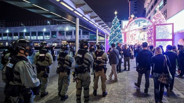Anti-government demonstrators protest on Christmas Eve in Hong Kong, China.