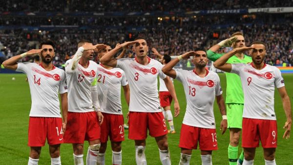 Turkish players salute at the end of the Euro 2020 Group H qualification football match between France and Turkey at the Stade de France in Saint-Denis, outside Paris on Oct 14, 2019.