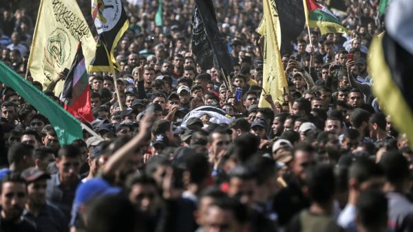 Mourners chant slogans as they carry the body of Palestinian Islamic Jihad senior leader Baha Abu Al-Ata during his funeral in Gaza City on November 12, 2019.  (AFP/ File Photo)