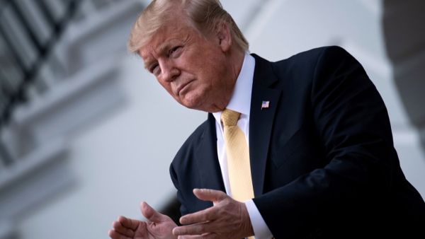 US President Donald Trump claps during an event for 2018 NASCAR Cup Series Champion Joey Logano on the South Lawn of the White House on April 30, 2019, in Washington, DC. (Brendan Smialowski / AFP)