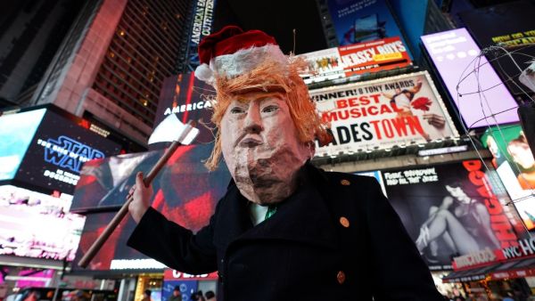 Over 1000 protesters gather in Times Square December 17, 2019 as the New York City Coalition to Impeach and Remove joins national demonstrations to demand an end to Trump's presidency. TIMOTHY A. CLARY / AFP