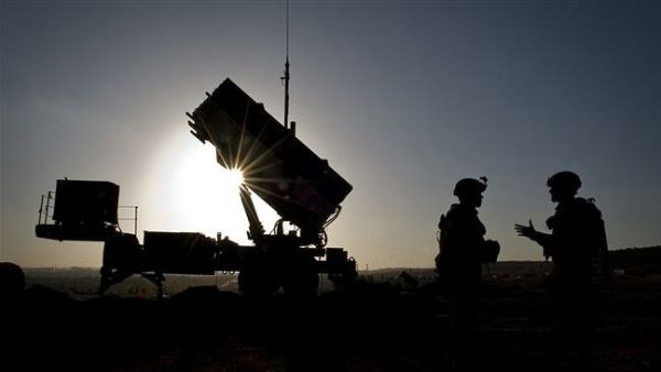 US Air Force shows US soldiers with the 3rd Battalion, 2nd Air Defense Artillery Regiment talking after a routine inspection of a Patriot missile battery. (AFP)