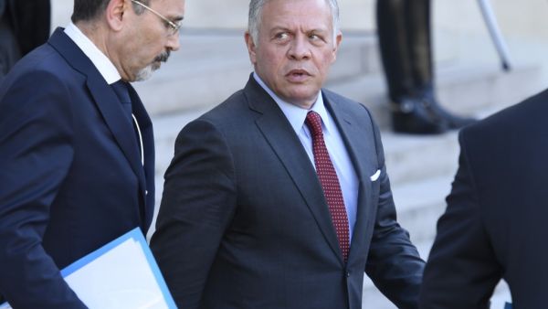 King Abdullah II of Jordan leaves the Elysee presidential Palace in Paris on May 15, 2019 after attending a launching ceremony for the 'Christchurch call', an initiative pushed by New Zealand's Prime Minister. (AFP)