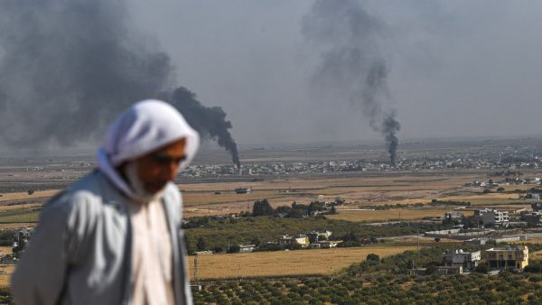 Turkey will not stop its operation against Kurdish militants in northern Syria, President Recep Tayyip Erdogan said Friday, dismissing what he called "threats" from other countries. Ozan KOSE / AFP