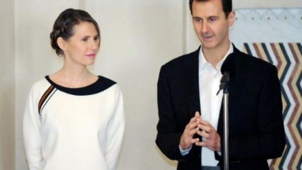 Bashar al-Assad and his wife Asmaa al-Assad. (AFP/ File Photo)
