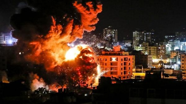 The Israeli military strikes a target inside Gaza (Mahmud Hams/AFP) banner image