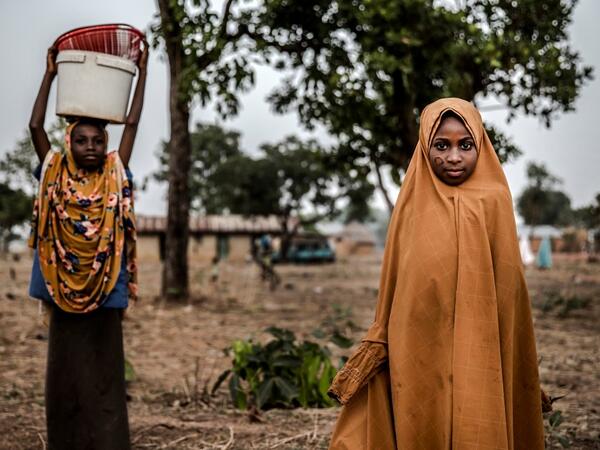 A Fulani girl poses for a portrait while attending to the market at Kachia Grazing Reserve, Kaduna State, Nigeria, on April 18, 2019. Luis TATO / AFP
