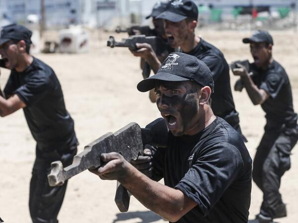 Palestinian military cadets take part in a training session organised by Hamas' military wing, the Ezzedin al-Qassam Brigades, in Gaza City on July 20, 2019.  MAHMUD HAMS / AFP