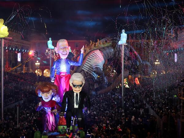 Giant figures depicting German fashion designer Karl Lagerfeld (R), and French fashion designers Sonia Rykiel (L) and Jean-Paul Gaultier are seen during the 136th Nice Carnival parade in Nice, southeastern France, on February 15, 2020. The Carnival takes place until February 29, 2020 on the theme 'King of Fashion'. VALERY HACHE / AFP