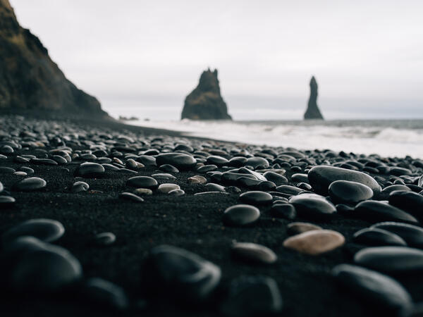 Stones on a black beach in Iceland (Shutterstock)