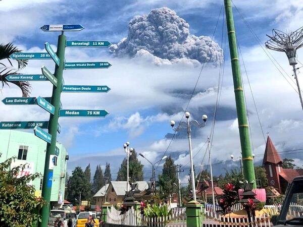 Rumbling Mount Sinabung on Indonesia’s Sumatra island sends a column of volcanic materials as high as 16,400 feet into the sky (Twitter)