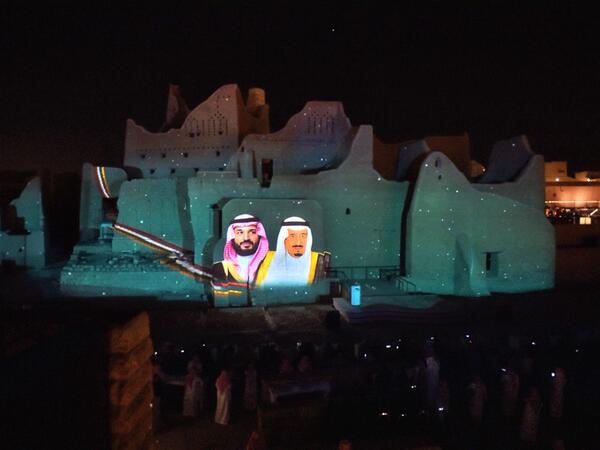 A picture of Saudi King Salman bin Abdulaziz (R) and his son Crown Prince Mohammed bin Salman is projected at the historical site of al-Tarif in Diriyah district, on the outskirts of Saudi capital Riyadh, on November 20, 2020. Saudi Arabia hosts the G20 summit on November 21 in a first for an Arab nation, with the downsized virtual forum dominated by efforts to tackle a resurgent coronavirus pandemic and crippling economic crisis. FAYEZ NURELDINE / AFP