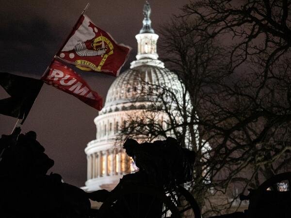 A Trump flag flies over the grounds of the U.S. Capitol on January 06, 2021 in Washington, DC. A pro-Trump mob stormed the Capitol earlier, breaking windows and clashing with police officers. Trump supporters gathered in the nation's capital to protest the ratification of President-elect Joe Biden's Electoral College victory over President Donald Trump in the 2020 election. John Moore/Getty Images/AFP
