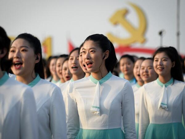 Members of Chorus sing during a rehearsal before the celebrations marking the 100th anniversary of the founding of the Communist Party of China in Beijing 
