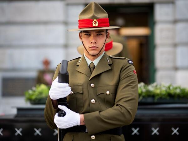 A New Zealand soldier stands guard during a Mounting of the Vigil and dressing of the Tomb of the Unknown Warrior commemoration starting the ceremony marking the 100th anniversary of the end of World War I at the National War Memorial in Wellington, New Zealand, on November 11, 2018. 
Marty MELVILLE / AFP