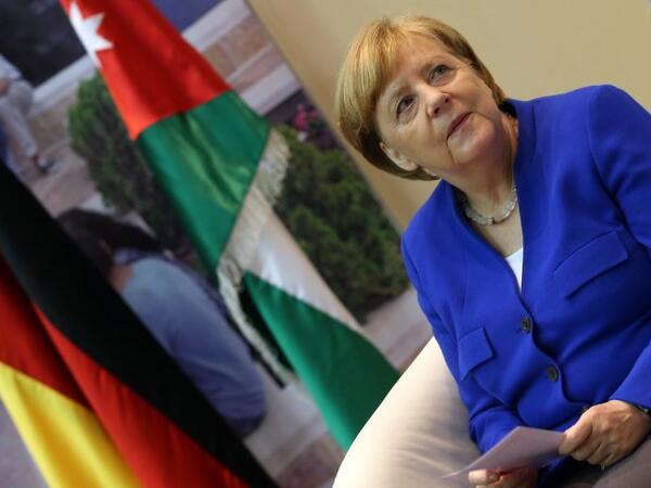 German Chancellor Angela Merkel arrives to give a speech during her visit to the German-Jordanian University in the Jordan city of Madaba, June 21, 2018. (AFP/ Ahmad Abdo)
