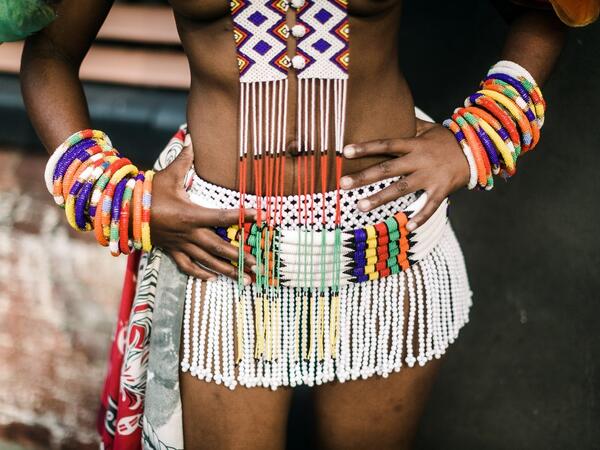 A young woman dressed up in traditional attire poses as she takes part in an audition organised by the Indoni Culture School in the South African city of Durban Rajesh JANTILAL / AFP