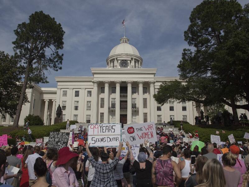 Demonstrators gathered to protest HB 314, a bill passed by the Alabama Legislature last week making almost all abortion procedures illegal. Julie Bennett/Getty Images/AFP