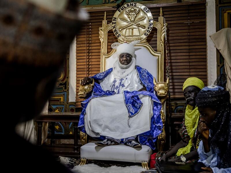 Mohammed Abubakar Bambado, the Sarkin Fulani of Lagos, sits on his throne while presiding over an assembly with Fulani people looking for his advice in his Palace at the district of Surulere in Lagos, Nigeria on April 28, 2019. Luis TATO / AFP