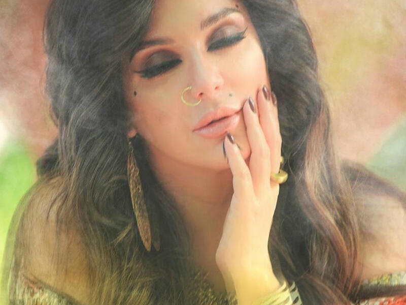 In her latest photos Fawakherji appeared in bright colored clothes and wavy hair Source sulaffawakherji Instagram