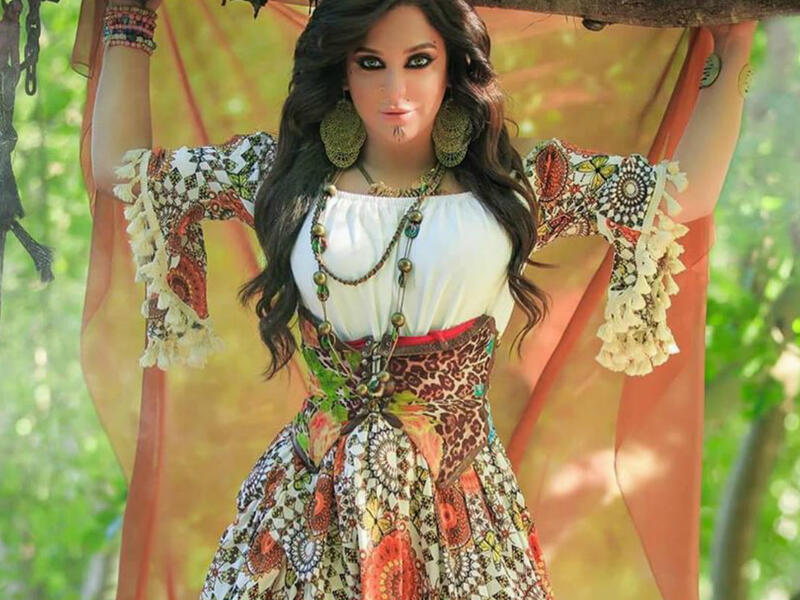 In her latest photos Fawakherji appeared in bright colored clothes and wavy hair Source sulaffawakherji Instagram