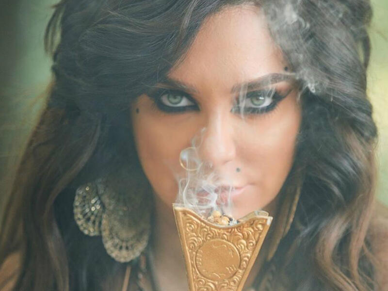 In her latest photos Fawakherji appeared in bright colored clothes and wavy hair Source sulaffawakherji Instagram