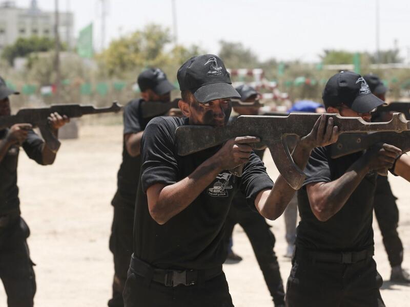 Palestinian military cadets take part in a training session organised by Hamas' military wing, the Ezzedin al-Qassam Brigades, in Gaza City on July 20, 2019.  MAHMUD HAMS / AFP