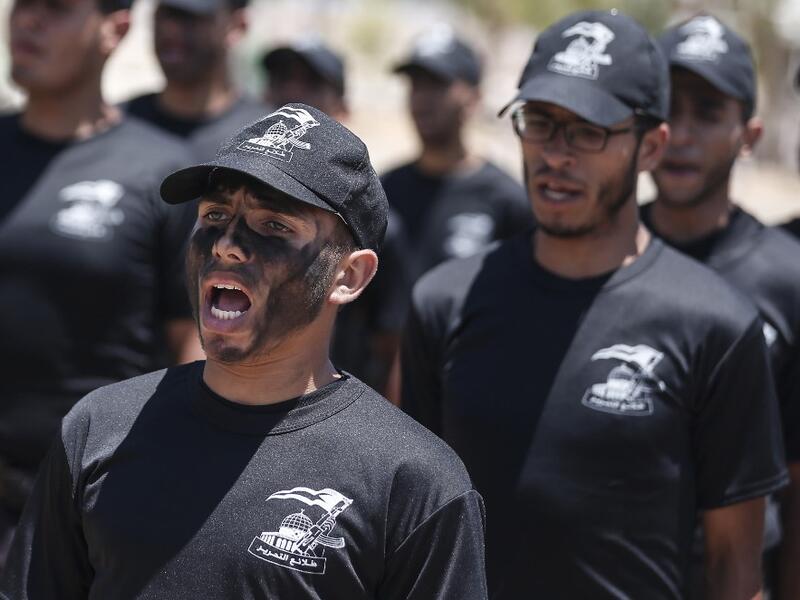 Palestinian military cadets take part in a training session organised by Hamas' military wing, the Ezzedin al-Qassam Brigades, in Gaza City on July 20, 2019.  MAHMUD HAMS / AFP