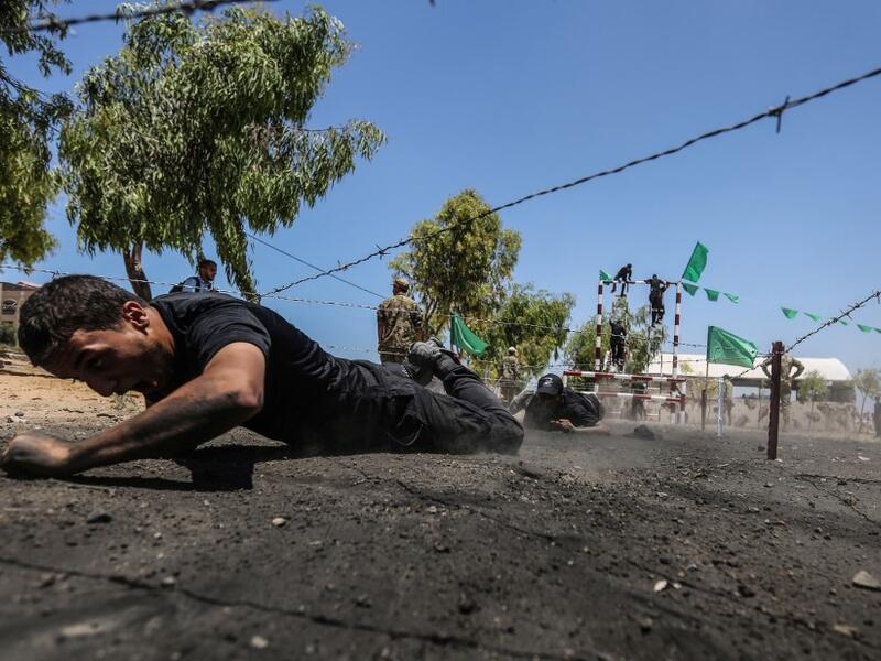 Palestinian military cadets take part in a training session organised by Hamas' military wing, the Ezzedin al-Qassam Brigades, in Gaza City on July 20, 2019.  MAHMUD HAMS / AFP