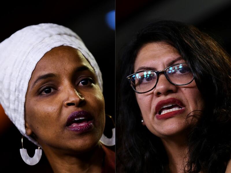 Democrat US Representatives Ilhan Abdullahi Omar (L) and Rashida Tlaib during a press conference, to address remarks made by US President Donald Trump earlier in the day, at the US Capitol in Washington, DC on July 15, 2019. (AFP/ File Photo)