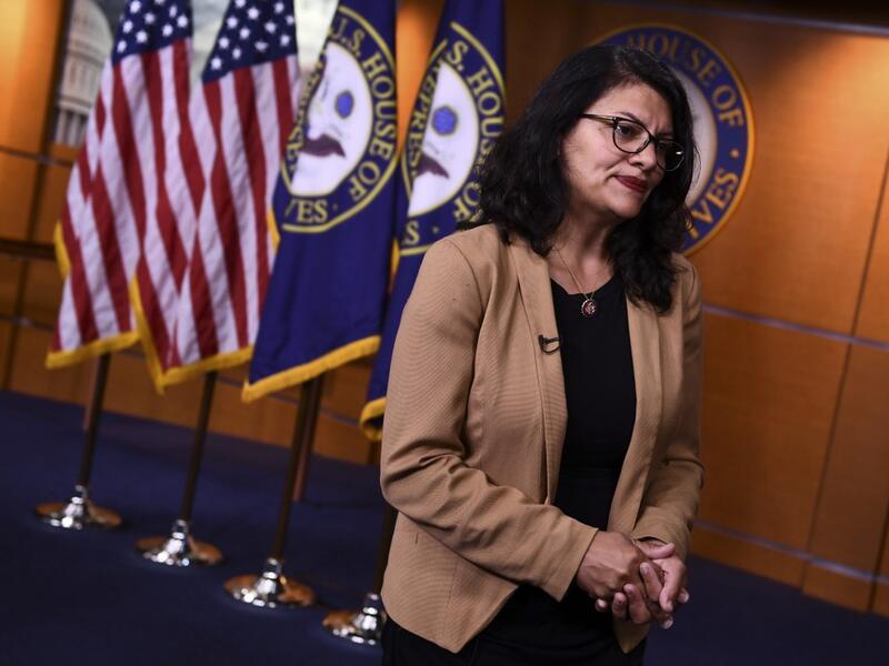 US Representative Rashida Tlaib (D-MI) looks on during an interview after a press conference, to address remarks made by US President Donald Trump earlier in the day, at the US Capitol in Washington, DC.  (AFP/ File Photo)