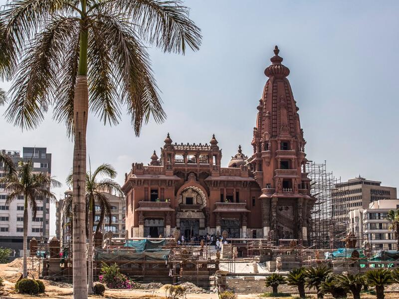 This picture taken on August 18, 2019 shows restoration works ongoing at the historic "Le Palais Hindou" (also known as the "Baron Empain Palace") built by in the early 20th century by Belgian industrialist Edouard Louis Joseph, Baron Empain, in the classical Khmer architectural style of Cambodia's Angkor Wat, in the Egyptian capital Cairo's northeastern Heliopolis district.  Khaled DESOUKI / AFP