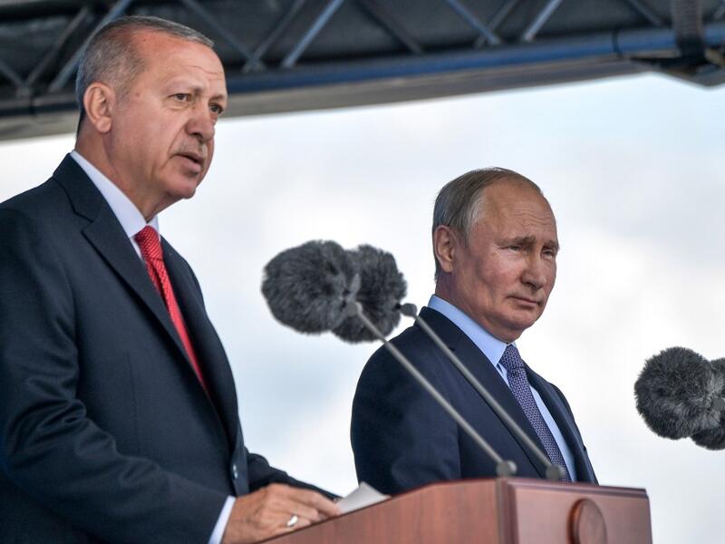 Russian President Vladimir Putin (R) and his Turkish counterpart Recep Tayyip Erdogan deliver a joint speech during the opening ceremony of the MAKS-2019 International Aviation and Space Salon in Zhukovsky outside Moscow on August 27, 2019.  Alexey NIKOLSKY / SPUTNIK / AFP