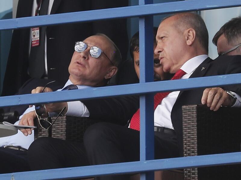 Russian President Vladimir Putin (L) and Turkish President Recep Tayyip Erdogan (R) watch demonstration flights at the MAKS-2019 International Aviation and Space Salon opening day in Zhukovsky outside Moscow on August 27, 2019.  Maxim SHIPENKOV / POOL / AFP