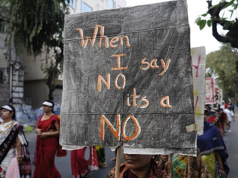 This picture shows a woman holding a banner which reads 'no means no' during a rally to remember a woman gang-raped in New Delhi (Shutterstock)	