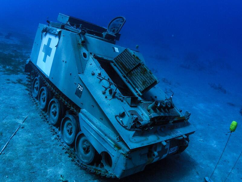 A tracked medical vehicle: Jordan is not the only country in the region to sink vehicles for divers to explore: later this month, Bahrain will open a theme park off Diyar Al Muharraq which includes a submerged Boeing 747. (Aqaba Special Economic Zone Authority/AFP)