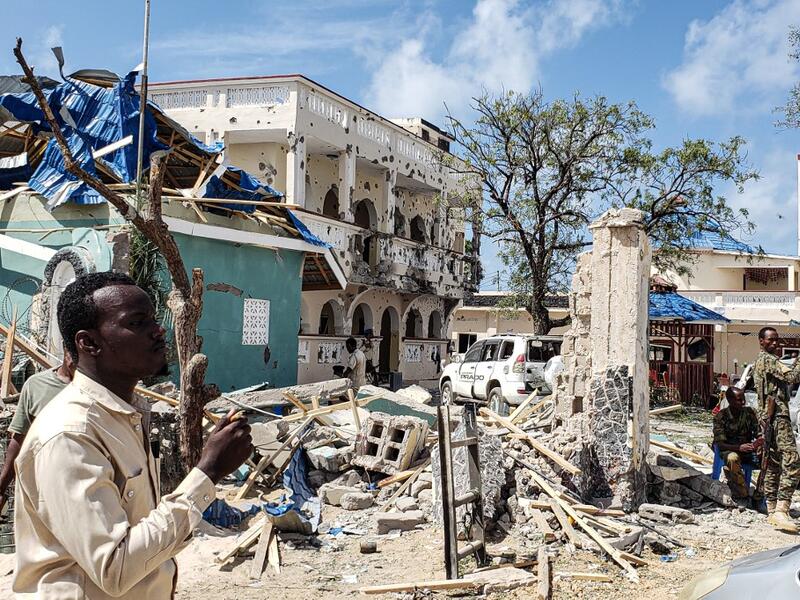 A suicide bomber rammed a vehicle loaded with explosives into the Medina hotel in the port town of Kismayo before several heavily armed gunmen forced their way inside, shooting as they went, authorities said. AFP