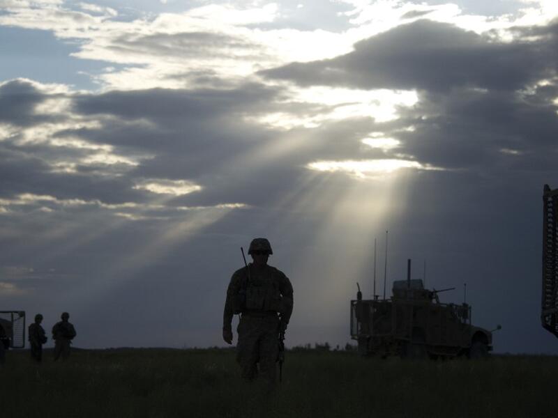 US Sergeant Andrew Warnerwalks to a Mine Resistant Ambush Protected (MRAP) vehicle in the village of Hasti in the province of Paktikain Afghanistan. (AFP/ File Photo)