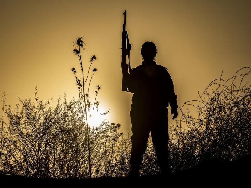 A member of the Bethnahrin Women Protection Forces (HSNB), an all-female Syriac-Assyrian paramilitary group under the umbrella of the Syrian Democratic Forces. (AFP/ File Photo)