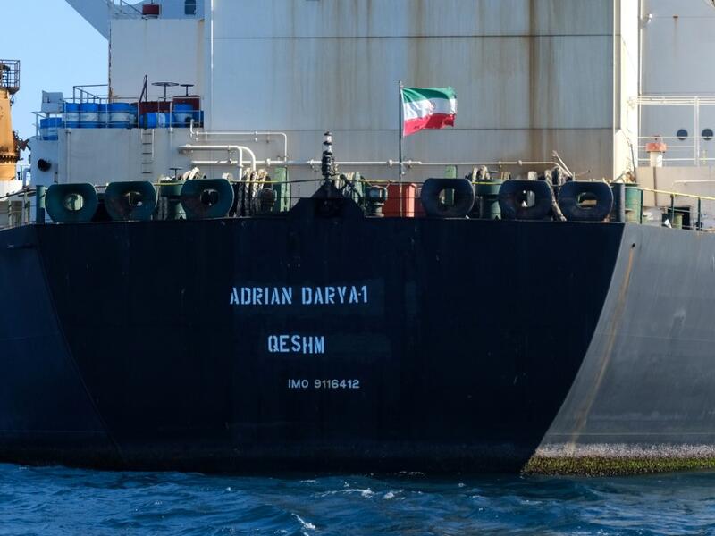 Iranian flag flutters on board the Adrian Darya oil tanker (AFP)