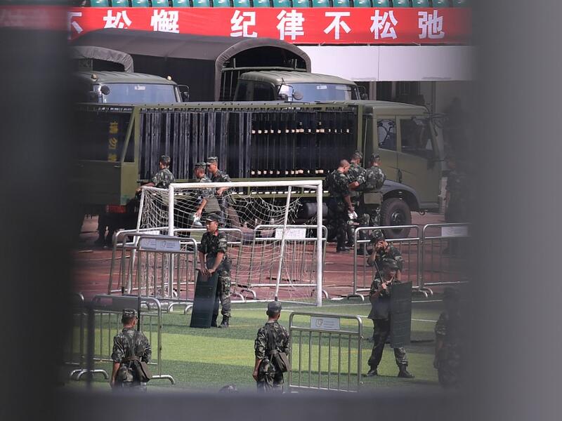 Chinese military personnel train at Shenzhen Bay stadium in Shenzhen in China's southern Guangdong province (AFP)
