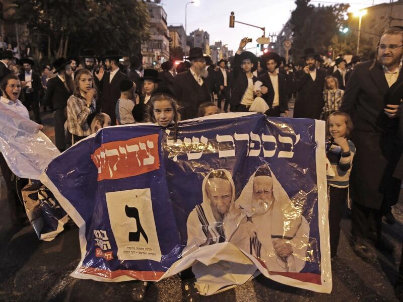 Ultra Orthodox Jews attend an election campaign rally of the Yahadut Hathora (United Torah Judaism) at the centre of Jerusalem on September 15 2019, two days ahead of the Israeli general elections. MENAHEM KAHANA / AFP