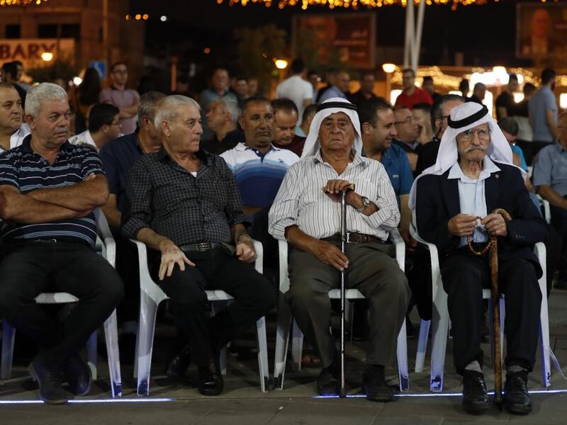 Supporters of the mainly Arab Joint List alliance attend an electoral campaign rally in the northern Arab-Israeli town of Sakhnin on September 15, 2019. Ahmad GHARABLI / AFP