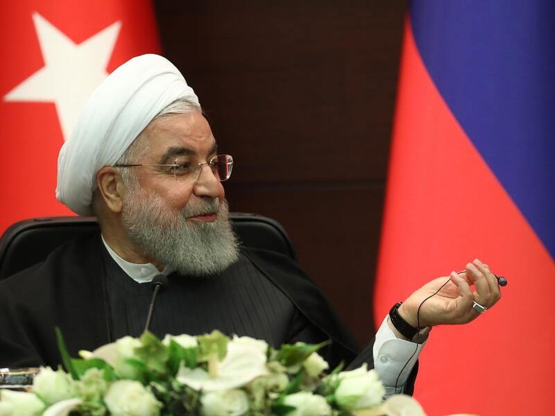 Iranian President Hassan Rouhani speaks during a joint press conference with Turkish and Russian counterparts following a trilateral meeting on Syria, in Ankara on September 16, 2019. (Adem ALTAN / AFP)